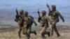 NATO troops take part in Steadfast Dart 2025 training exercises in Romania on February 19.