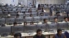 Independent Election Commission workers sit at computer terminals while election information from all over the country is gathered at the Data Center in Kabul.