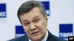 Ukraine's ousted president, Viktor Yanukovych, speaks at a news conference in Rostov-on-Don, Russia.