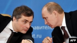 Russian President Vladimir Putin (right) appointed Vladislav Surkov as an aide in 2013. (file photo)