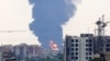 A plume of heavy smoke and fire rise from an oil refinery in southern Tehran, after it was hit in an overnight Israeli strike, on June 15, 2025. Could the Israel-Iran conflict affect Russia’s war against Ukraine?