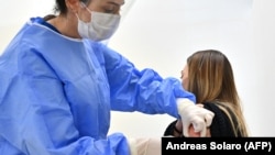 A woman receives the Sputnik V vaccine in San Marino on March 29. 