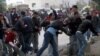 Palestinian Protesters Attack International Mission