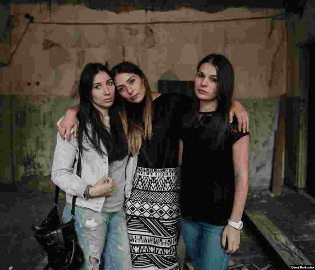 Lena Gaitova (left) and sisters Zarina (center) and Rozita Tsirikhova were 12, 14, and 10... on September 1, 2004. The girls escaped at the end of the siege, but when Lena got home, she found her parents dressed in black and her 16-year-old brother, Alan, missing. First her parents said he was in the hospital. But soon they admitted he had died at the school. Today, the three girls remain best friends. All three study at the same institute in Moscow; Zarina has already graduated. They are pictured in the former library of School No. 1, where the militants stored their weapons. "It was easier before, when we were little and we didn't understand everything," says Lena. "We didn't understand what it meant when suddenly there were seven fewer of our friends in class. Now we're grown up. As time goes by, the pain doesn't go away. Quite the opposite, it gets harder. We are more aware." 