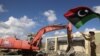 U.K. Warns Against Sheltering Qaddafi