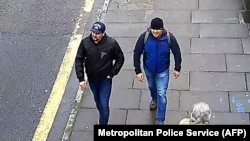 A handout picture taken in Salisbury of two Russian men who have been identified as Aleksandr Petrov (right) and Ruslan Boshirov.