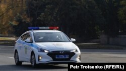 Полиция көлігі.