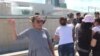 WATCH: Kazakh Mothers Clash With Police Near President's Offices