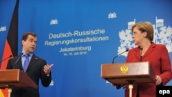  Angela Merkel și Dmitri Medvedev la Yekatinburg