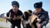 Kyrgyz Supreme Court Rules That Police Crackdown On Women's Rally Was Illegal