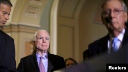 U.S. Senator John McCain called for a single, select committee comprised of both House and Senate members, something Senate Majority Leader Mitch McConnell (riht) opposes.