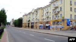 Donetsk, which once had a population of a million, is now noticeably empty, a resident journalist says, and those who remain mostly stay indoors and work from home. 