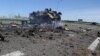 Un vehicul blindat sidtrus în luptele din apropierea aeroportului Luhansk