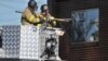Americans Mourn 'Batman' Killings