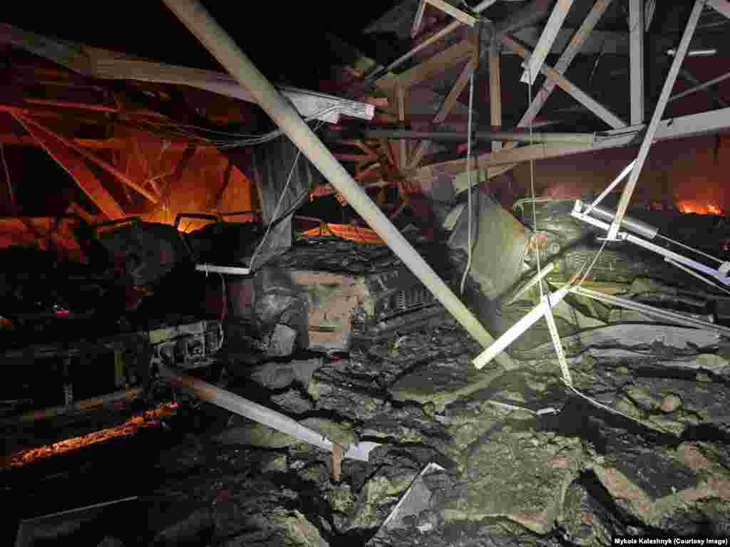 Kyiv's military authorities say nine vehicles were destroyed and 27 damaged in the incident. 