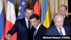 Кіраўнікі Францыі, Украіны і Расеі. Ілюстрацыйнае фота. 