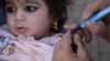 A polio vaccine being administered to a child in the southern Afghan region of Kandahar on September 17.