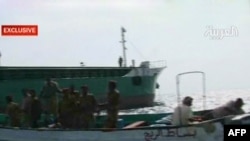 An Al Arabiya screen grab of an Iranian boat is seized by Yemeni coast gaurds in the Red Sea for allegedly carrying arms to Shi'ite rebels locked in fierce fighting with the army since August in the rugged mountains of northern Yemen.