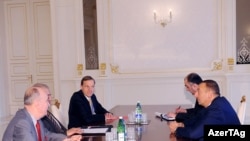 Azerbaijani President Ilham Aliyev (right) receives cochairs of the OSCE Minsk Group