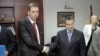 Aleksandar Vučić i Ivica Dačić prilikom potpisivanja koalicionog sporazuma, juli 2012.