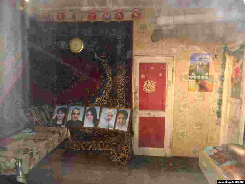 The hallway that Private Valery Permyakov allegedly entered on his way to carrying out the killings in the Avetisians' home. Five family members were shot; 6-month-old Seryozha and his mother, Araksia Pogosian (second and third from right), were stabbed with a bayonet.