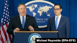 U.S. Secretary of State Mike Pompeo (left) and U.S. Treasury Secretary Steven Mnuchin announce sanctions against Iran during a news conference at the Foreign Press Center in Washington, D.C., on November 5.