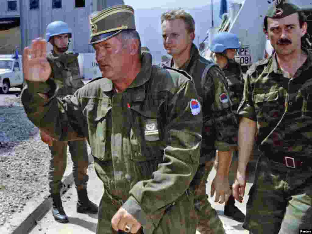 Mladic arrives at Sarajevo's airport on August 6, 1993, to discuss the possibility of opening two supply roads to Sarajevo and the withdrawal of Bosnian Serb troops from Mt. Igman.