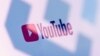 RUSSIA -- The logo of Russia's state communications regulator, Roskomnadzor, is reflected in a laptop screen showing Youtube page - generic