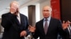 Russian President Vladimir Putin (right) gestures as Belarusian President Alyaksandr Lukashenka mops his brow during a meeting in the Black sea resort of Sochi in February.