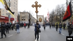 Russian nationalists take part in the so-called "Russian March" in Moscow on November 4, 2015.