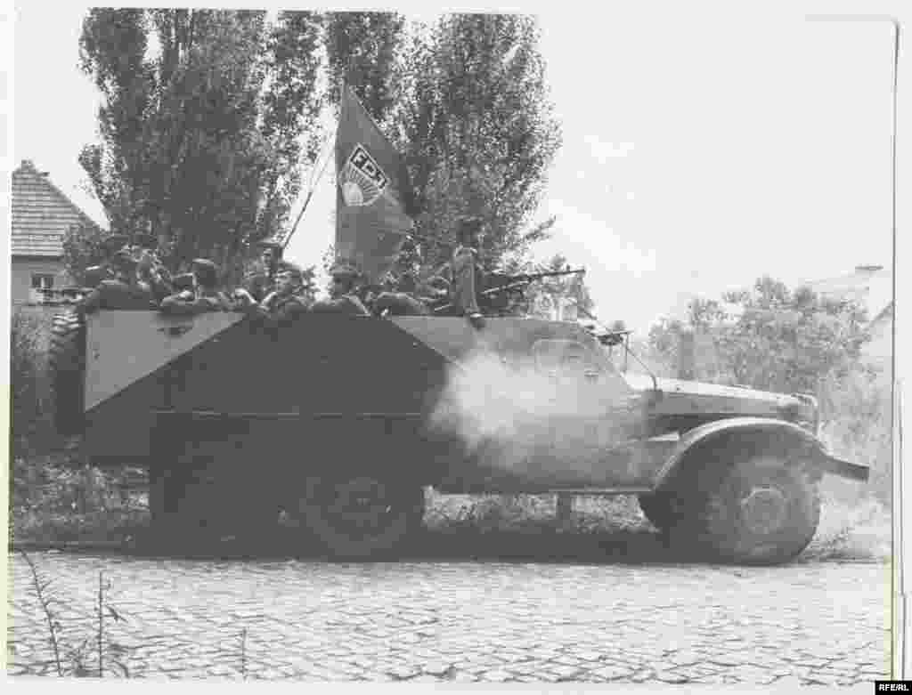 East German troops were prominently deployed following the division of East and West Berlin on August 13, 1961. - The photographs in this slide show were all culled from the RFE/RL archives at the Hoover Institution at Stanford University.