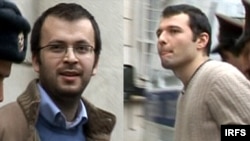 Jailed activists Emin Milli (left) and Adnan Hajizada