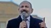 Armenian Prime Minister Nikol Pashinian addresses his supporters during a gathering on Republic Square in Yerevan on February 25.