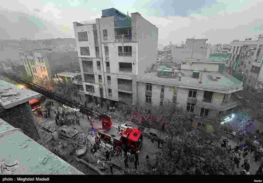 First responders on the site of the Israeli attack.