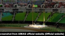 Türkmenistanyň we Aziýanyň Olimpiýa Geňeşiniň baýdaklarynyň galdyryş dabarasy boş tribunalaryň fonunda geçdi