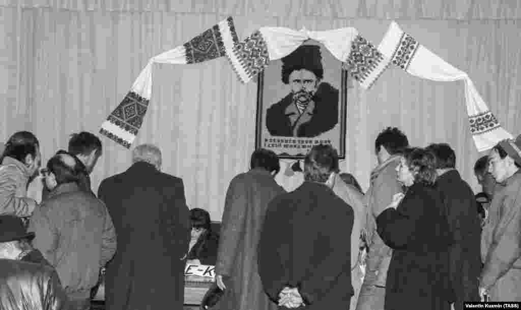 Under the watchful gaze of Taras Shevchenko, voters cast their ballots. Shevchenko&#39;s literary legacy is widely regarded as the bedrock of modern Ukrainian literature and, to a large extent, the modern Ukrainian language.&nbsp;