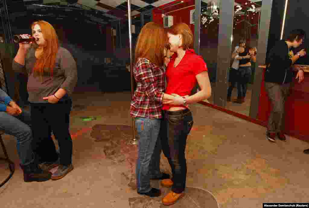 Women at a private gay club in St. Petersburg in 2013. A survey taken in 2013 showed 74 percent of Russians thought homosexuality was unacceptable in society, with a further 5 percent saying gays should be &quot;liquidated.&quot;