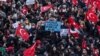People take part in a protest in Istanbul on March 23, the day Istanbul Mayor Ekrem Imamoglu was controversially jailed as part of a corruption investigation.