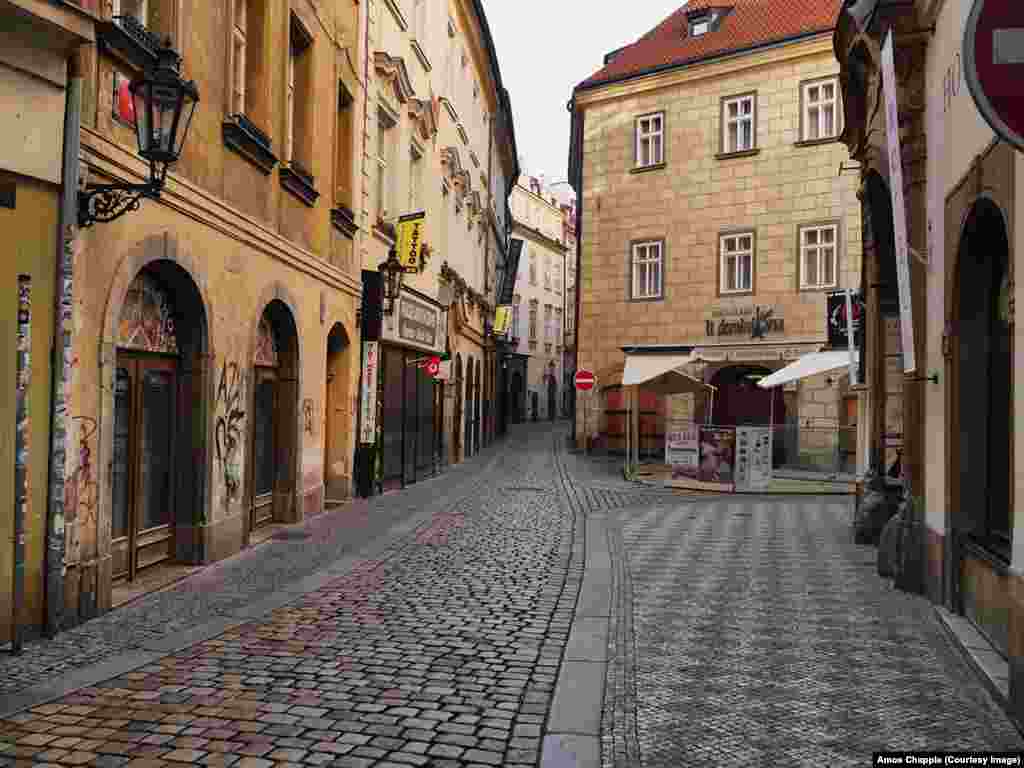 Empty lanes in the heart of Prague's historic tourist district. 