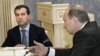 Dmitri Medvedev şi Vladimir Putin la Moscova an aprilie 2008.