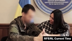Irina Krynina meets her partner in Ukraine after traveling from Russia when she learned he had been taken prisoner. She decided to stay in Ukraine to help other captured Russian soldiers reconnect with their families and aid prisoners on both sides return home.