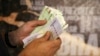 Iran's Currency Plummets To Record Low Against Dollar