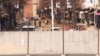 Kosovo - A wall being build in Mitrovica