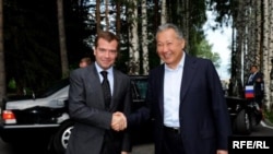 Russian President Dmitry Medvedev (left) is greeted by his Kyrgyz counterpart, Kurmanbek Bakiev, at the CSTO summit in Cholpon-Ata in late July.