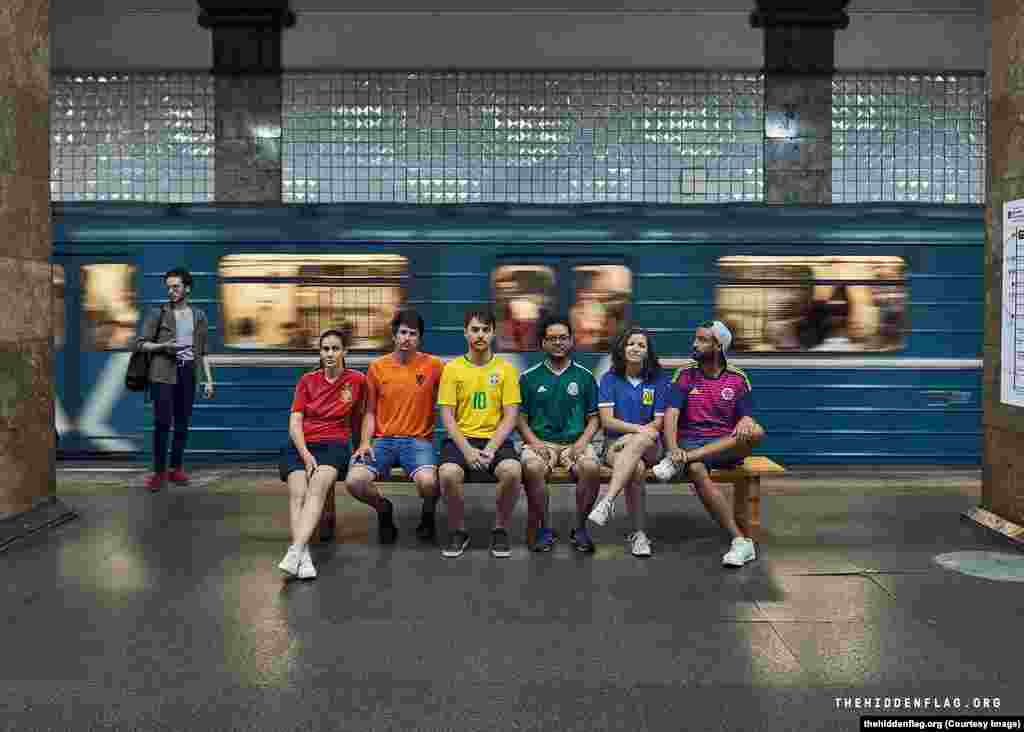 Six gay rights activists from (left to right) Spain, The Netherlands, Brazil, Mexico, Argentina, and Colombia, have taken to the streets of Russia to display the rainbow flag while the World Cup is under way. 