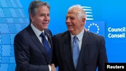 US Secretary of State Antony Blinken (left) is welcomed by European Union High Representative for Foreign Affairs and Security Policy Josep Borrell ahead of a meeting in Brussels on April 4.