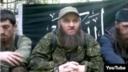 A screen grab of Chechen insurgent Doku Umarov from a video posted on YouTube on December 18, just hours after Chechen Republic head Ramzan Kadyrov told journalists in Moscow that the Islamist rebel was dead. 