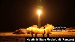 Huthi rebels in Yemen say they will halt attacks on Saudi Arabia and are awaiting a 'positive' response from Riyadh. (file photo)