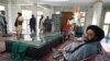 Taliban fighters at the tomb of late Afghan muhajedin leader Ahmad Shah Massoud in Panjshir Province on September 15, days after the militants repaired the site following public outrage over its desecration.