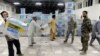 Kerry Meets Feuding Afghan Candidates